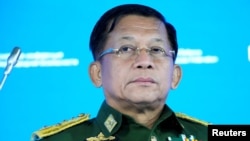 រូប​ឯកសារ៖ នាយ​ឧត្តមសេនីយ៍ Min Aung Hlaing មេបញ្ជាការ​របប​យោធាភូ​មា​ ចូល​រួម​សន្និសីទ​មួយ​នៅ​ទី​ក្រុង​មូស្គូ​ប្រទេស​រុស្ស៊ី​កាល​ពី​ថ្ងៃ​ទី​២៣ ខែ​មិថុនា ឆ្នាំ​២០២១។