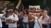 Anti-government demonstrators stage a massive protest in Caracas to press Venezuelan leader Nicolás Maduro for free elections, respect for the National Assembly and the return of other democratic norms, April 19, 2017. (A. Algarro/VOA)