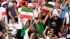 Eron o'yini davomida stadionda ko'tarilgan plakatlar, Doha, Qatar, 2022-yil, 21-noyabr