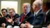 President Donald Trump speaks during a meeting with steel and aluminum executives in the Cabinet Room of the White House, March 1, 2018, in Washington. From left, Roger Newport of AK Steel, John Ferriola of Nucor, Trump, Dave Burritt of U.S. Steel Corporation, and Tim Timkin of Timken Steel. 