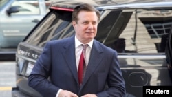 FILE - Former Trump campaign manager Paul Manafort arrives for arraignment on charges of witness tampering, at U.S. District Court in Washington, June 15, 2018.