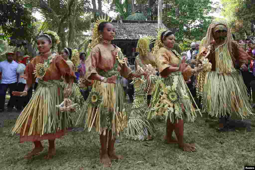 Mah Meri women wearing their traditional dresses perform the "Main Jo-oh" dance during the Ari Muyang festival in the village of Sungai Bumbun on Pulau Carey, some 140 km (87 miles) southwest of Kuala Lumpur, Malaysia.
