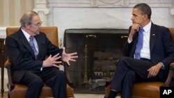 President Barack Obama meets with Sudan Special Envoy Ambassador Princeton Lyman in the Oval Office, April 1, 2011.