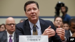 FBI Director James Comey testifies on Capitol Hill in Washington, July 7, 2016, before the House Oversight Committee to explain his agency's recommendation to not prosecute Hillary Clinton.