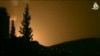 In this image taken from video obtained from Shaam News Network, which has been authenticated based on its contents and other AP reporting, smoke and fire fill the skyline over Damascus, Syria, early Sunday, May 5, 2013 after an Israeli airstrike.