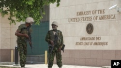 Kenyan police stand guard outside the U.S. embassy in Port-au-Prince on July 5, 2024. (Odelyn Joseph/AP)