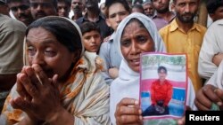 آتشزدگی میں ہلاک ہونے والوں کے لواحقین سراپا احتجاج۔فائل فوٹو