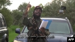 Video screen shot of Nigerian Islamist extremist group Boko Haram leader and obtained by AFP shows Abubakar Shekau, delivering a speech at an undisclosed location, Aug. 24, 2014.