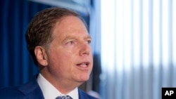 FILE - Geoffrey S. Berman, the United States attorney for the Southern District of New York, holds a news conference, Aug. 8, 2018, in New York.