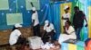 Vote count starts in a polling station in Rwanda's capital Kigali, Aug. 4, 2017, for the presidential elections. 