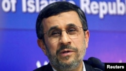 FILE - Mahmoud Ahmadinejad talks during a news conference at the end of his visit to Cairo, Egypt, Feb. Feb. 7, 2013.