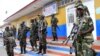 Congolese Revolution Army (CRA) rebels stand guard at the border entry into Rwanda near Goma in the eastern Democratic Republic of Congo (DRC), November 20, 2012,
