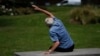 In this Tuesday, June 17, 2014 photo, George Jackson, 85, an army veteran and former boxer participates at a parkour class for elderly people at a park in south London. 'I just sometimes forget how old I am and that I can’t do certain things', said Jackson, the class’ oldest participant. The unique weekly class for people over 60 called parkour, a flashy discipline usually known for its acrobatic running, climbing and gravity-defying jumps. He said he struggles with a swollen ankle and knee but that the class has helped. 'I was limping around before and now I can walk straight,' Jackson said. 'But I still don’t plan to jump off of anything higher than a bench'.(AP Photo/Lefteris Pitarakis)