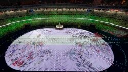 Athletes are introduced during the opening ceremony at the Olympic Stadium at the 2020 Summer Olympics, Friday, July 23, 2021, in Tokyo. (AP Photo/Morry Gash)