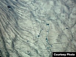 The surface of the Greenland Ice Sheet. A new study uses NASA data to provide the first detailed reconstruction of how the ice sheet and its many glaciers are changing. The research was led by University at Buffalo geologist Beata Csatho.