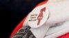 Badge affichant un symbole anti-MGF porté par une volontaire à une conférence lors de la Journée internationale de tolérance zéro pour les mutilations génitales féminines au Caire, Égypte, 6 février 2018. (REUTERS/Amr Abdallah Dalsh)