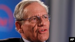 Former Washington Post reporter Bob Woodward speaks during an event sponsored by The Washington Post to commemorate the 40th anniversary of Watergate, June 11, 2012, at the Watergate office building in Washington. 