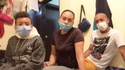 Jorge Moreno, Icsa Yanez y su hijo Josnier Moreno, familia de migrantes venezolanos en Colombia.