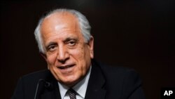 زلمی خلیلزاد نقش اساسی را در امضا توافق صلح میان ایالات متحده و هیات طالبان در دوحه، پایتخت قطر، بازی کرد