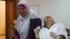 Though it was not easy at first, cooking together has helped women from the Bab Al-Tebbeneh and Jabal Mohsen bond, December 2014. (J. Owens / VOA)