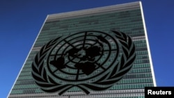 FILE - The United Nations logo is pictured in front of the United Nations Headquarters building during the 71st United Nations General Assembly in the Manhattan borough of New York, U.S.