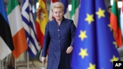 FILE - Lithuanian President Dalia Grybauskaite arrives for an EU summit at the Europa building in Brussels, Dec. 14, 2017.