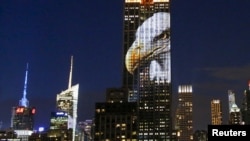 An image of an animal is projected onto the Empire State Building as part of an endangered species projection to raise awareness, in New York, Aug. 1, 2015. 