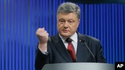 FILE - Ukrainian President Petro Poroshenko speaks during a news conference in Kyiv, Ukraine, Jan. 14, 2016.