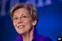 FILE - Sen. Elizabeth Warren, D-Mass. speaks to the Center for American Progress’s Second Annual Policy Conference in Washington, Nov. 19, 2014.