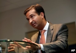 Rep. Carlos Curbelo, R-Fla., speaks during an interview in Homestead, Fla., May 29, 2018. In a district stretching from upscale Miami suburbs to the Everglades and down the Florida Keys to eccentric Key West, 70 percent of Curbelo’s constituents are Hispanic and nearly half are foreign born.