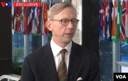 FILE - U.S. Special Representative for Iran Brian Hook speaks to VOA Persian, Dec. 18, 2018.
