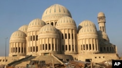 FILE - Iraq's special forces troops patrol near the grand mosque after defeating Islamic State militants on the eastern side of Mosul, Iraq, Thursday, Jan. 19, 2017. It was from here that IS leader Abu Bakr al-Baghdadi appeared for the first time in public, delivering a sermon broadcast online by militants on July 15, 2014.