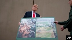 El presidente Donald Trump habla con periodistas tras recibir un informe sobre los prototipos de muro que quiere colocar en la frontera con México. San Diego, California, Marzo 13, 2018.