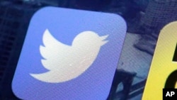 FILE - A Twitter app on an iPhone screen in New York, Oct. 18, 2018. 