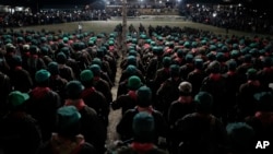 Fotografía de archivo de miembros del Ejército Zapatista de Liberación Nacional, EZLN, asisten a un evento que marca el 30 aniversario del levantamiento zapatista en Dolores Hidalgo, Chiapas, México, el domingo 31 de diciembre de 2023.