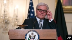 Menteri Luar Negeri Jerman Frank-Walter berbicara di Kementerian Luar Negeri AS (11/3). (AP/Molly Riley)
