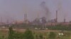 VIDEO: Citing financial risks of secession, industrialists set up worker patrols to remove armed insurgents. Patrick Wells reports from Mariupol, Ukraine.