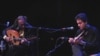 Iraqi musician Rahim Al Haj and Amir Koushkani of Iran join to play together as part of the Cultural Olympiad music program
