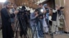 FILE - Afghan journalists attend a press conference by Afghanistan's Minister of Foreign Affairs Amir Khan Muttaqi, in Kabul on September 19, 2024.