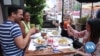  New Yorkers Raise a Glass, Toast the Return of Nightlife 