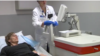 Stacy Erholtz receives a test to confirm she's in remission from myeloma after receiving a novel virotherapy in this screenshot from a Mayo Clinic video.