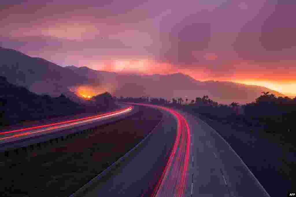 The 101 Highway was closed after the Thomas Fire jumped the road towards the Pacific Coast Highway in Ventura, California, Dec. 7, 2017.
