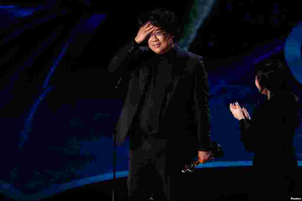 Bong Joon Ho wins the Oscar for Best Director for "Parasite" at the 92nd Academy Awards in Hollywood, Los Angeles, Calif., Feb. 9, 2020.