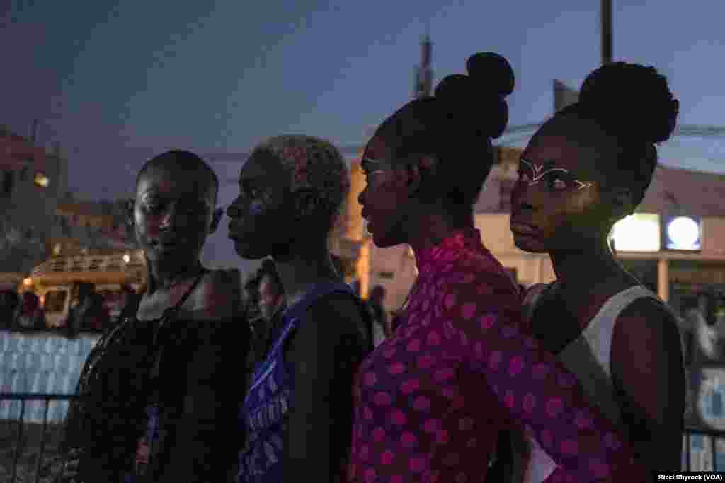 Models backstage before Dakar Fashion Week's "Street Show" show, June 29, 2017.