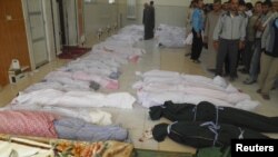 Puluhan warga sipil tewas akibat penyerbuan pasukan pemerintah Suriah di kota Houla (26/5).