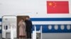 Chinese President Xi Jinping and his wife, Peng Liyuan, wave before their departure, at the Tarbes-Lourdes airport, France, on May 7, 2024.