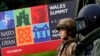 Mannequins of British soldiers dressed in combat gear are displayed at the entrance of the golf course of the Celtic Manor Hotel ahead of the NATO summit in Newport, Wales, September 3, 2014.