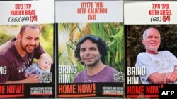 This combination of pictures created Jan. 31, 2025, shows Israeli hostages Yarden Bibas, left, Ofer Kalderon and Keith Siegel, right, who have been held in the Gaza Strip since the Oct. 7, 2023, terrorist attack by Hamas on Israel. 