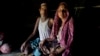 Rohingya Muslim man Sultan Mehmood, 62, and his wife, Haseena Begum, 45, sit for a photograph inside their shelter near Balukhali refugee camp, Bangladesh. The couple stayed in their hometown when violence broke out last month in Myanmar. That decision left the couple open to attack. “She was raped by three soldiers while I was mercilessly beaten up,” Mehmood said, sighing deeply.