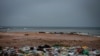 An uncontained garbage dump lies next to Virage Beach in Dakar, Senegal. (A. Hammerschlag/VOA)